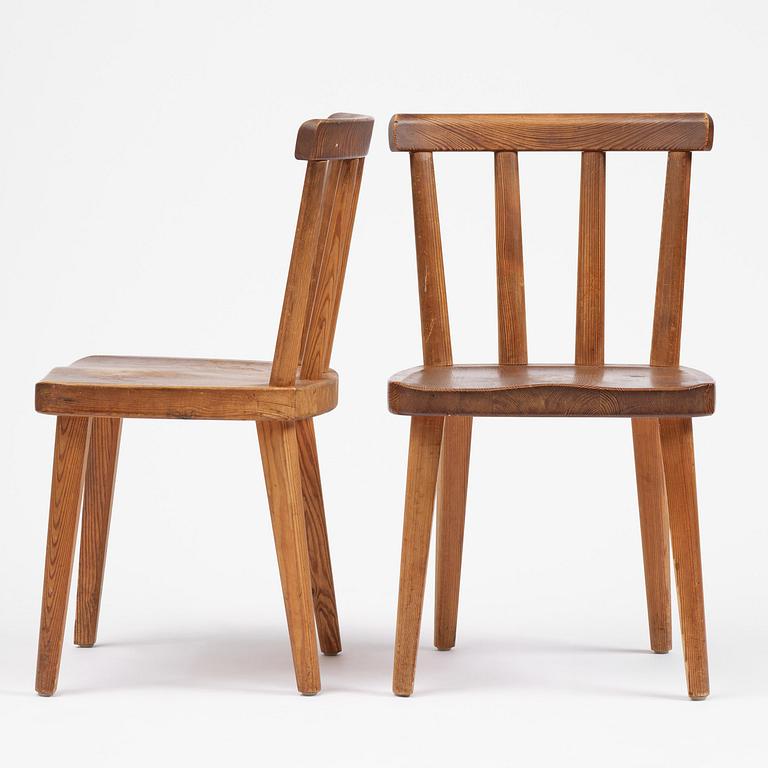 Axel Einar Hjorth, a set of six stained pine "Utö" chairs, Nordiska Kompaniet, Sweden, 1930s.