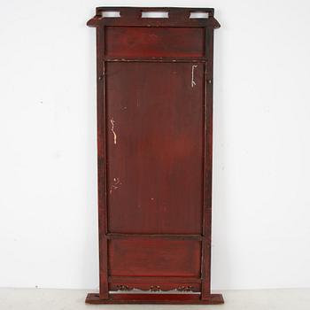 A lacquered mirror, Qing dynasty, 19th century.