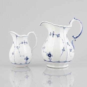 Two 'Blue Fluted Plain' porcelain pitcher, Royal Copenhagen, model 157 and 427, 1893-1923.