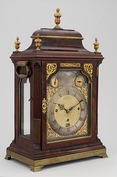 An Eardley Norton musical eight-bells and quarter chiming mahogany bracket clock playing four different tunes, verge escapment and engraved backplate.