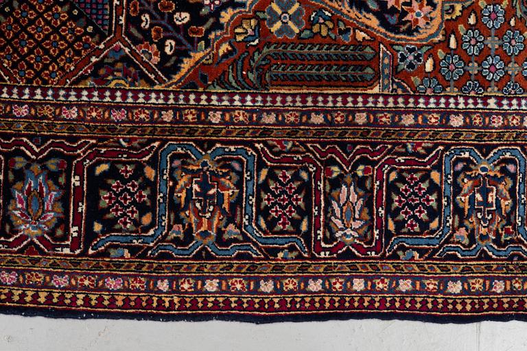 A rug, semi-antique Kashan, ca 216,5 x 140 cm.