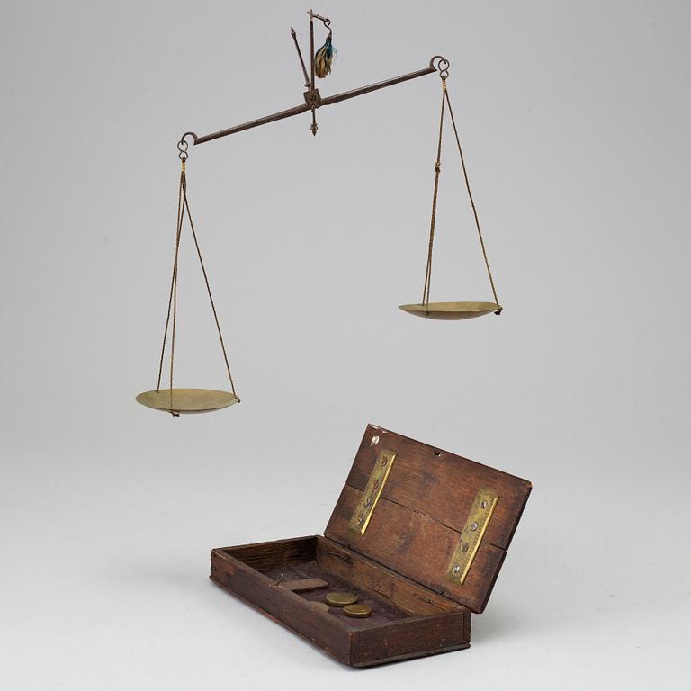 An iron and brass set of gold scales, 18th century.