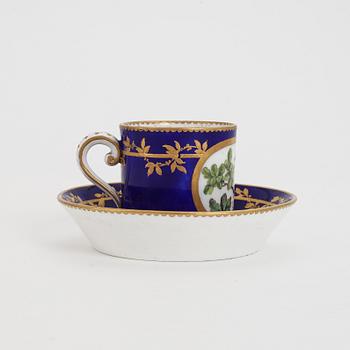 A Sèvres porcelain cup and sacuer, probably 1770's.