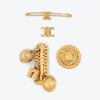 Céline, a set of four gold tone brooches.