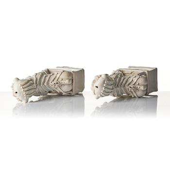 A pair of Chinese blanc de Chine 'Buddhist lion' joss stick holders, Qing dynasty, Kangxi (1662-1722).