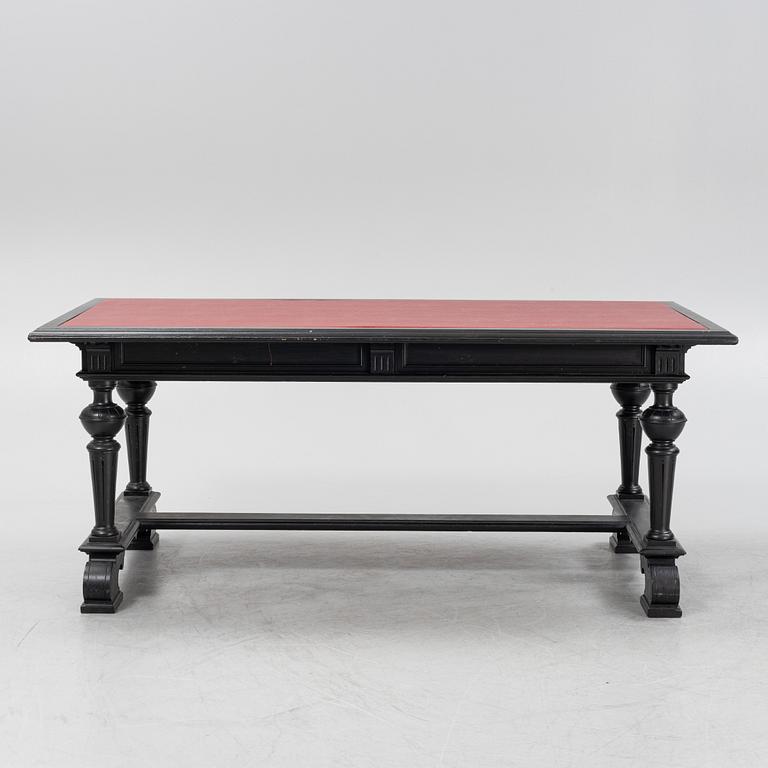 A renaissance style library table, around 1900.