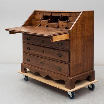 A mid 18th century oak secretaire.