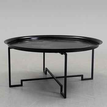 A coffee table designed in 2000 by Per Öberg for Svensk Tenn.