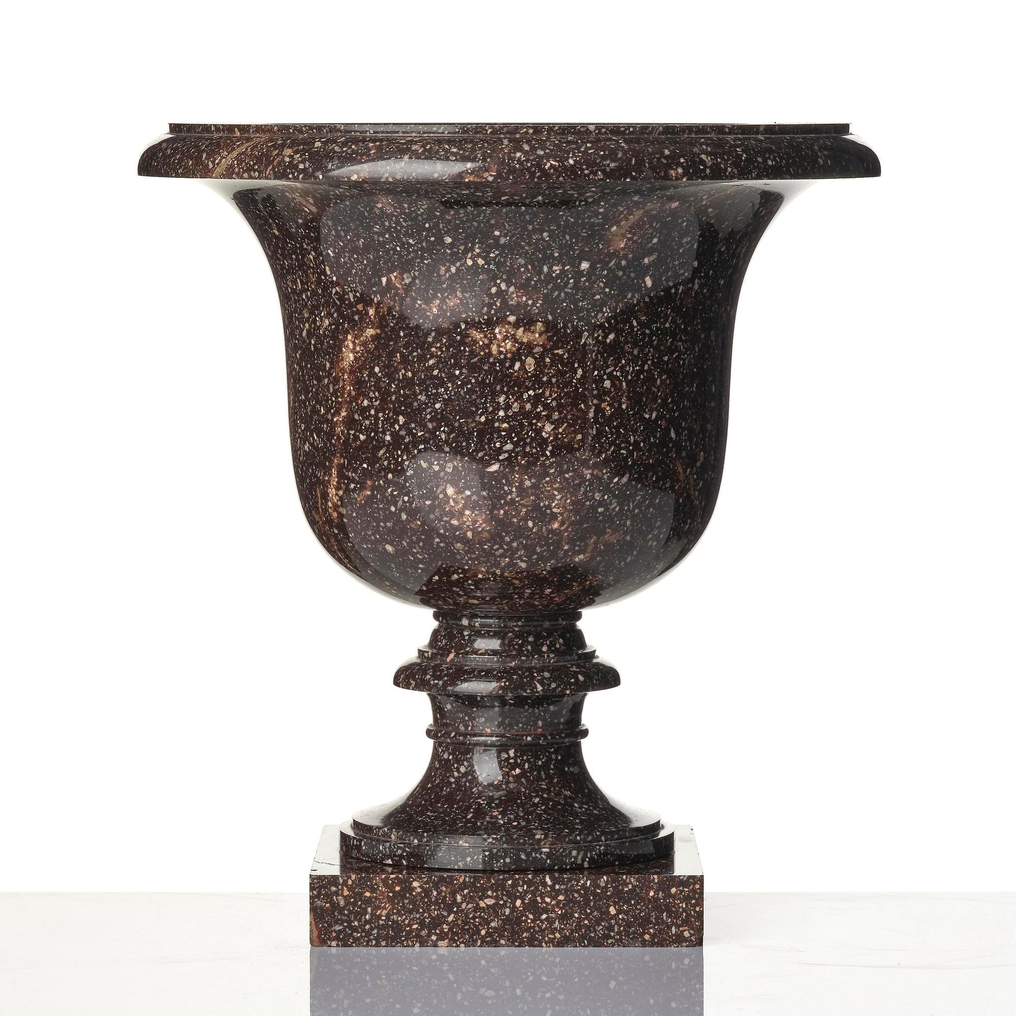 A Swedish Empire 'Blyberg' porphyry Medici shaped urn, early 19th century.
