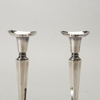 A Swedish 20th century pair of silver candle sticks mark of E Löfman Uppsala 1982.