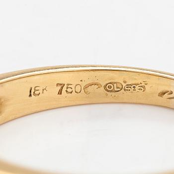 An 18K gold ring, set with emeralds and princess-cut diamonds totalling approx. 0.34 ct. Finnish import hallmarks.