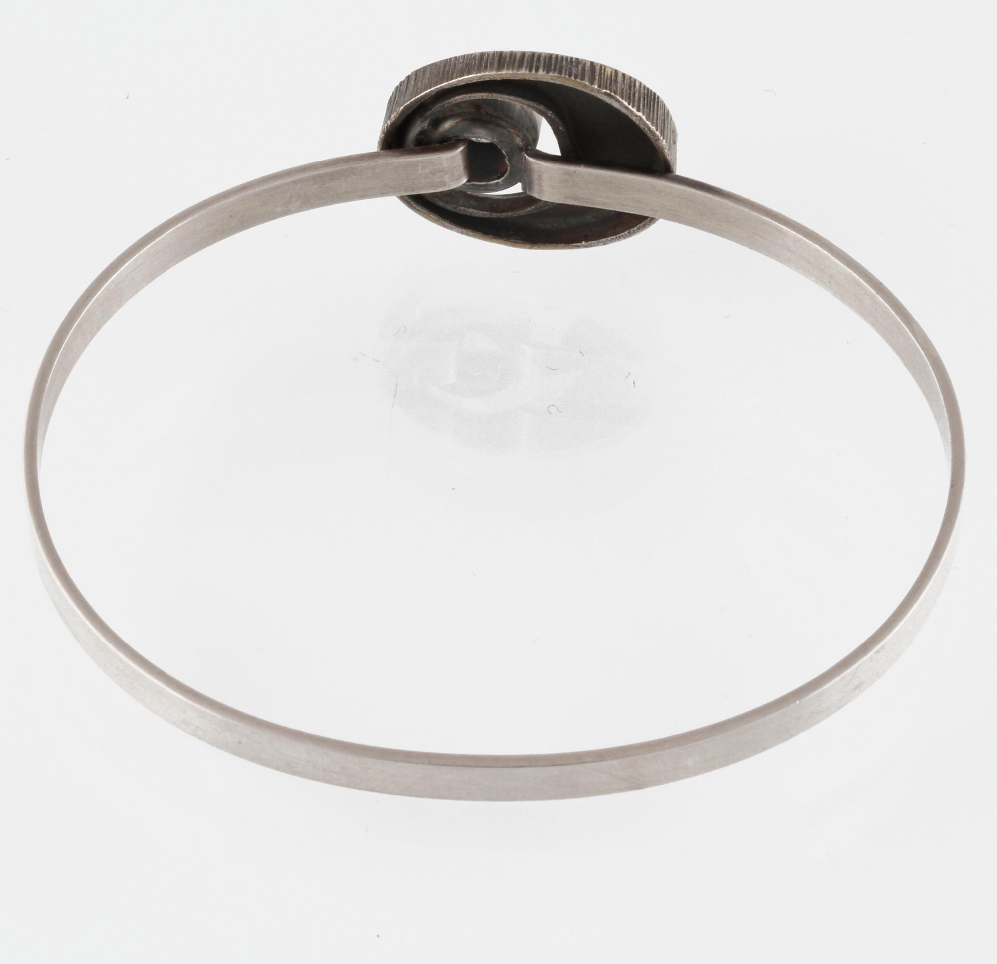 ARMRING, sterlingsilver med fasettslipad bergkristall, Sten & Laine, Turku, Finland, 1978. Vikt 9,6 gram.
