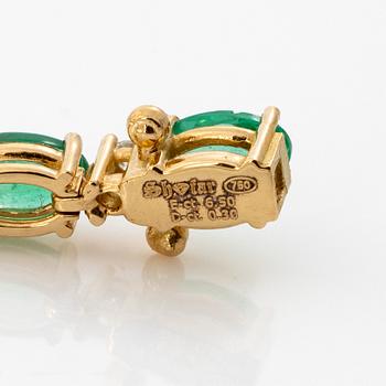 Bracelet 18K gold with emeralds and brilliant-cut diamonds.