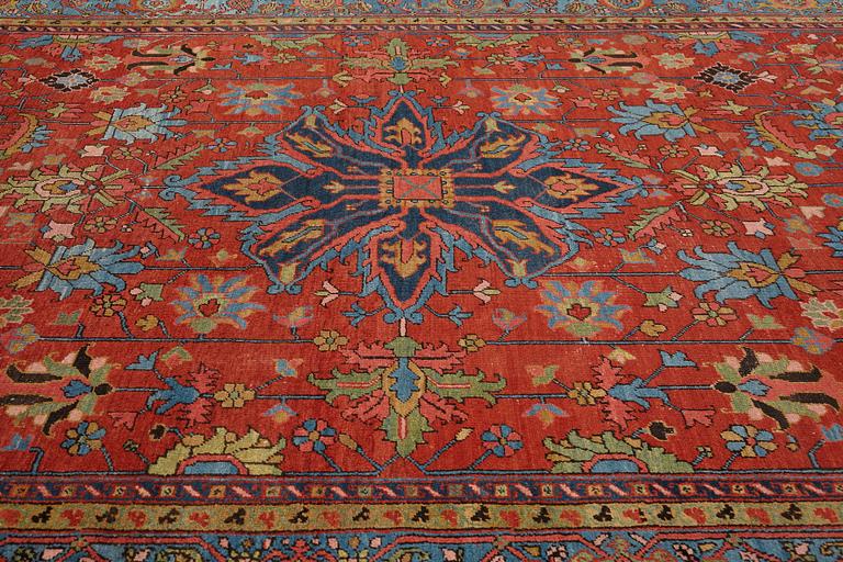 A carpet, an antique/semi-antique Heriz, ca 352 x 275 cm.