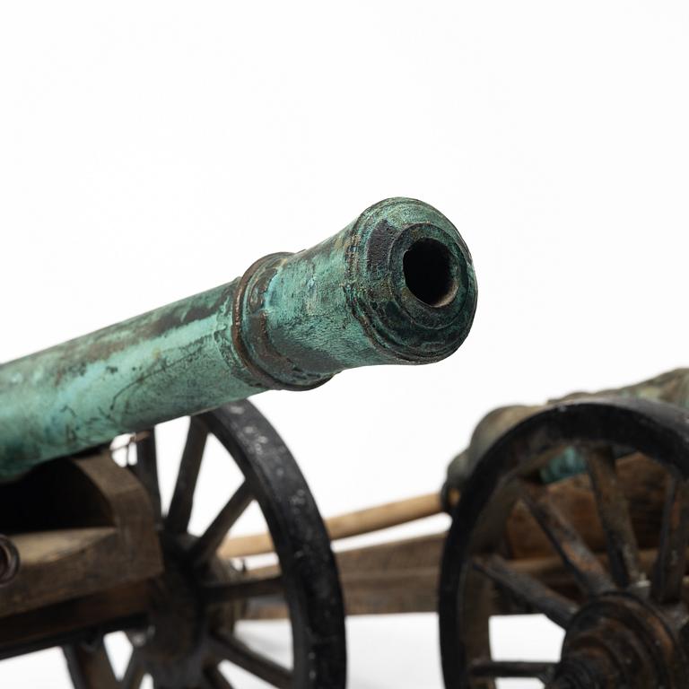 Modellkanoner ett par, 1900-tal.