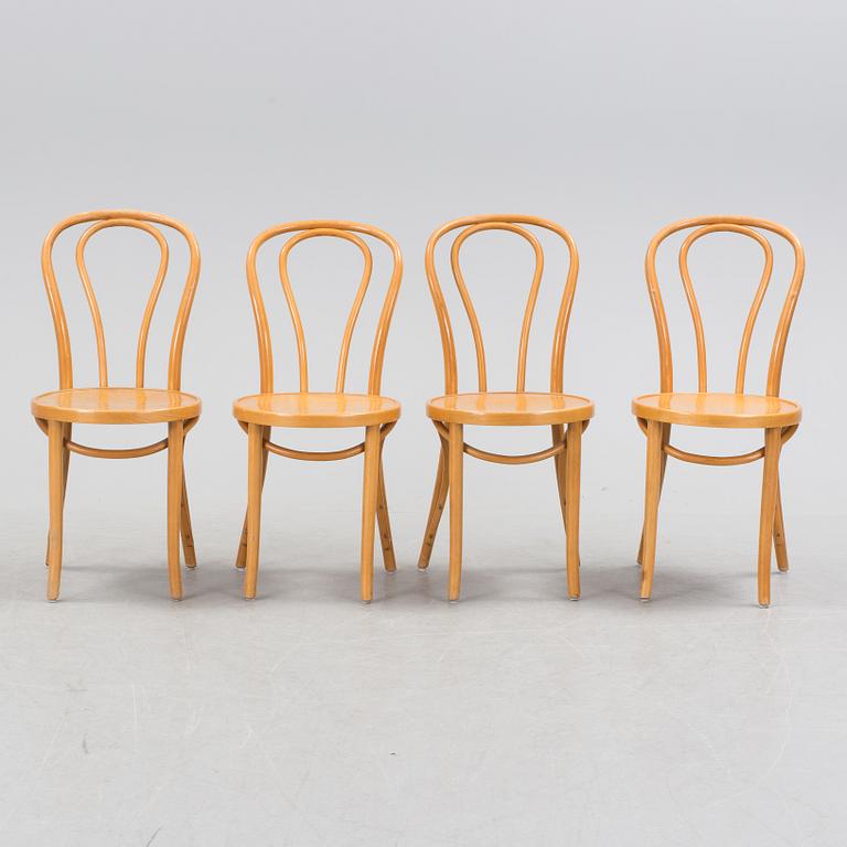 A set of four "Öglan" chairs by IKEA.