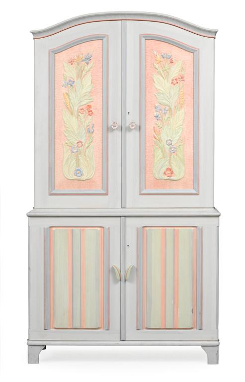 A Carl Malmsten cabinet, "Stigberget", with carved and painted decoration of flowers in colours.