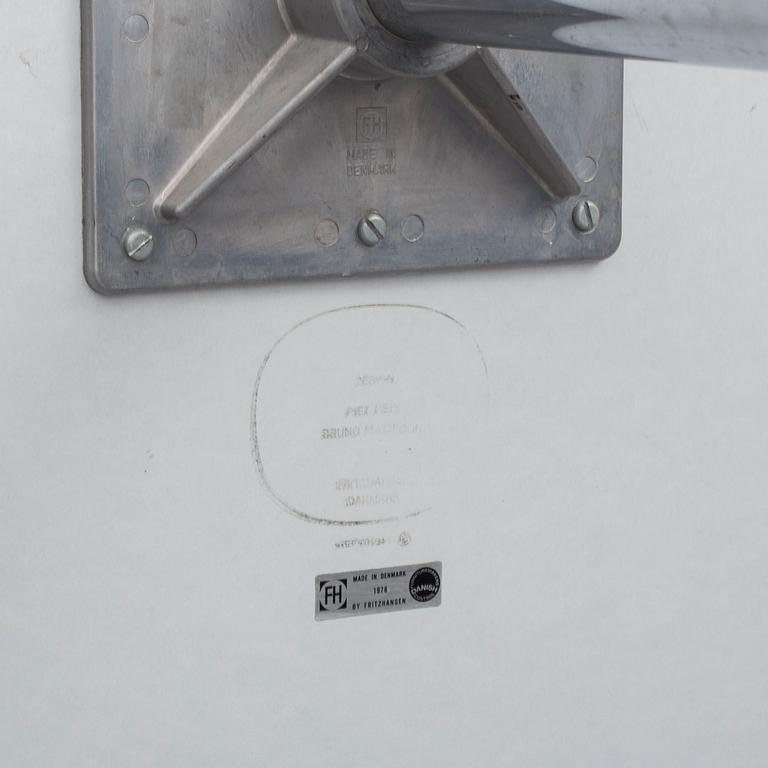 A 'Supercirkel' table by Bruno Mathsson & Piet Hein, Denmark, 1978.