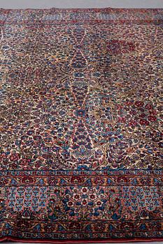 A CARPET, semi-antique, Kerman, ca 362,5 x 265 cm.