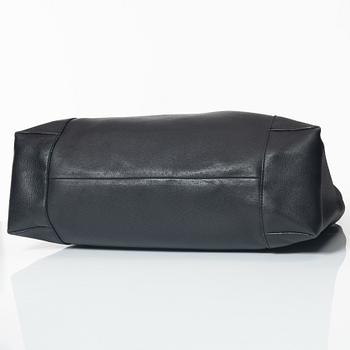 Gucci, A black leather hobo bag.