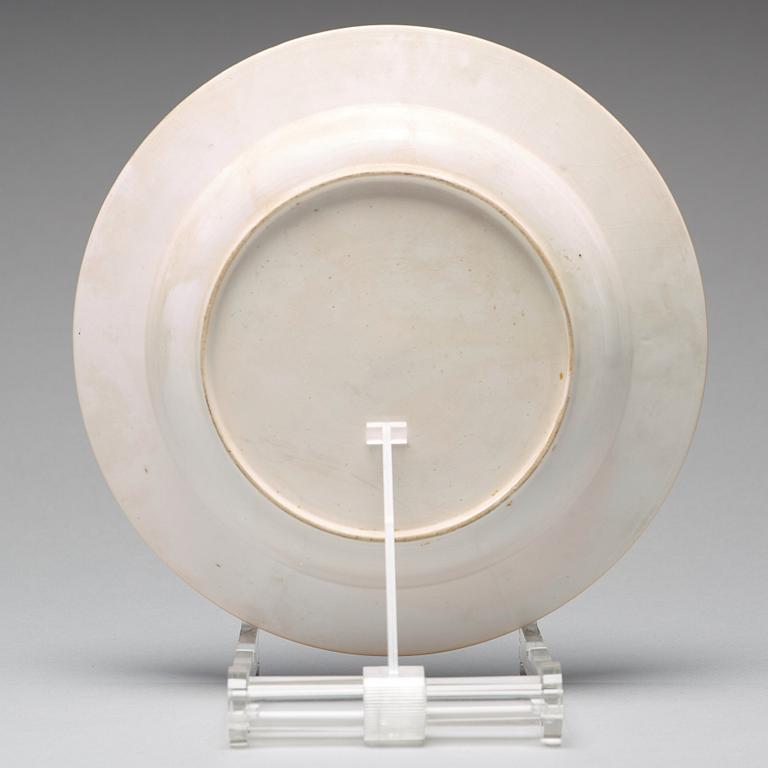 A set of eight blue and white armorial soup dishes, Qing dynasty, 18th Century.