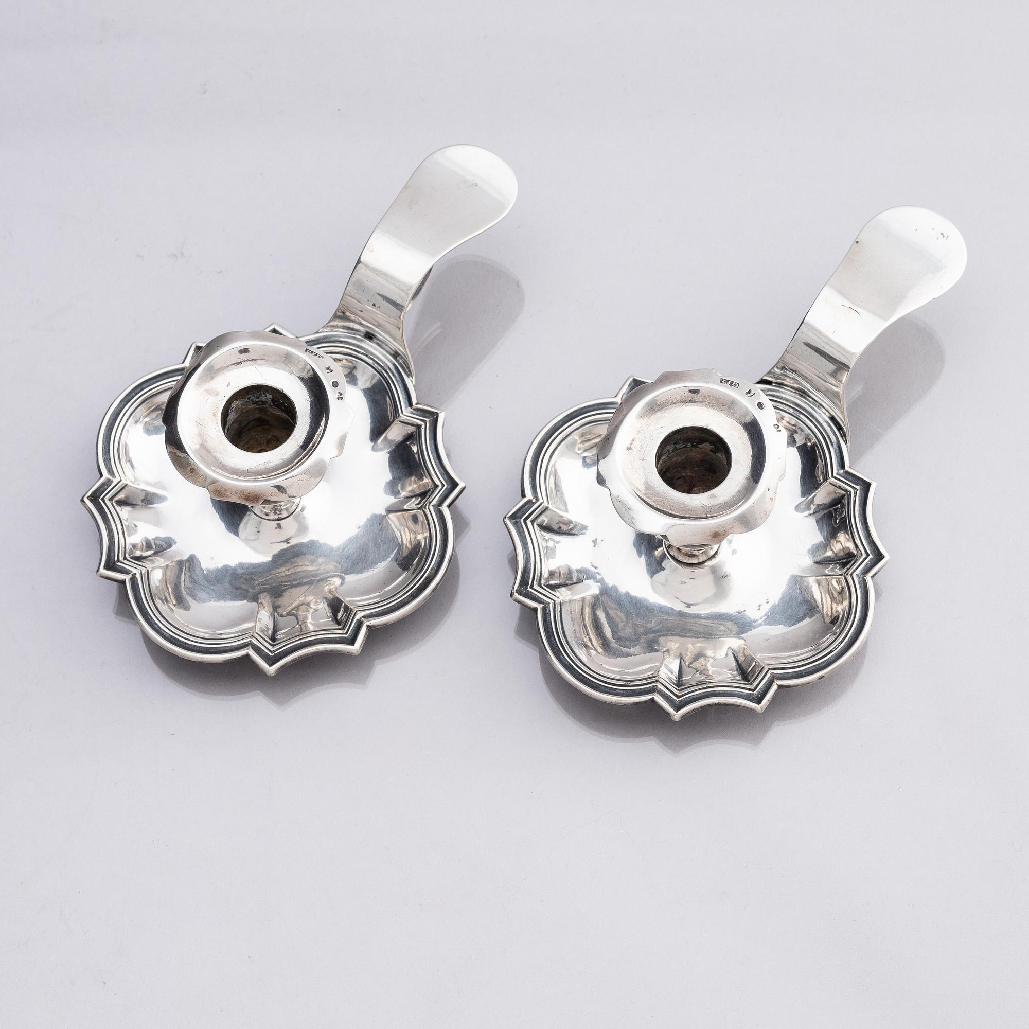 A pair of Swedish 18th century silver chamber-candlesticks, marks of Jürgen Friedrich Sickman, Stockholm 1757.