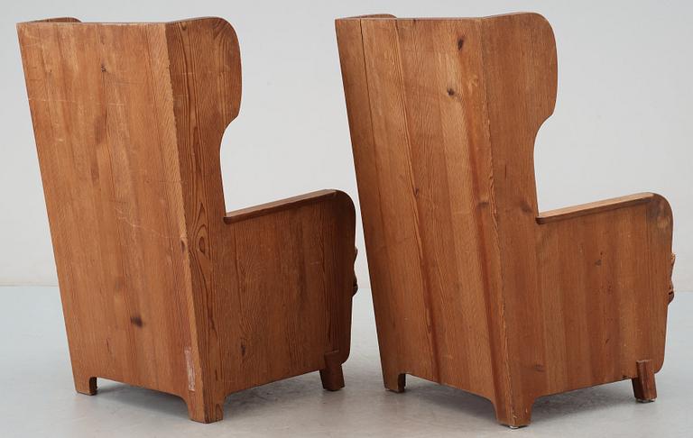 A pair of Axel Einar Hjorth 'Lovö' pine armchairs by Nordiska Kompaniet,