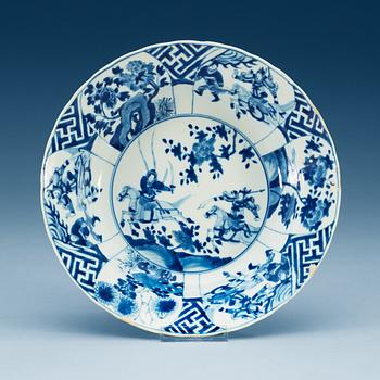1808. A blue and white klappmutz bowl, Qing dynasty, with Kangxi six character mark and of the period (1662-1722).