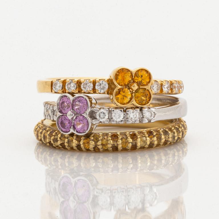 Yellow and pink sapphire and brilliant-cut diamond three rings.