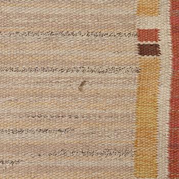 A flat weave carpet, c. 360 x 265 cm.