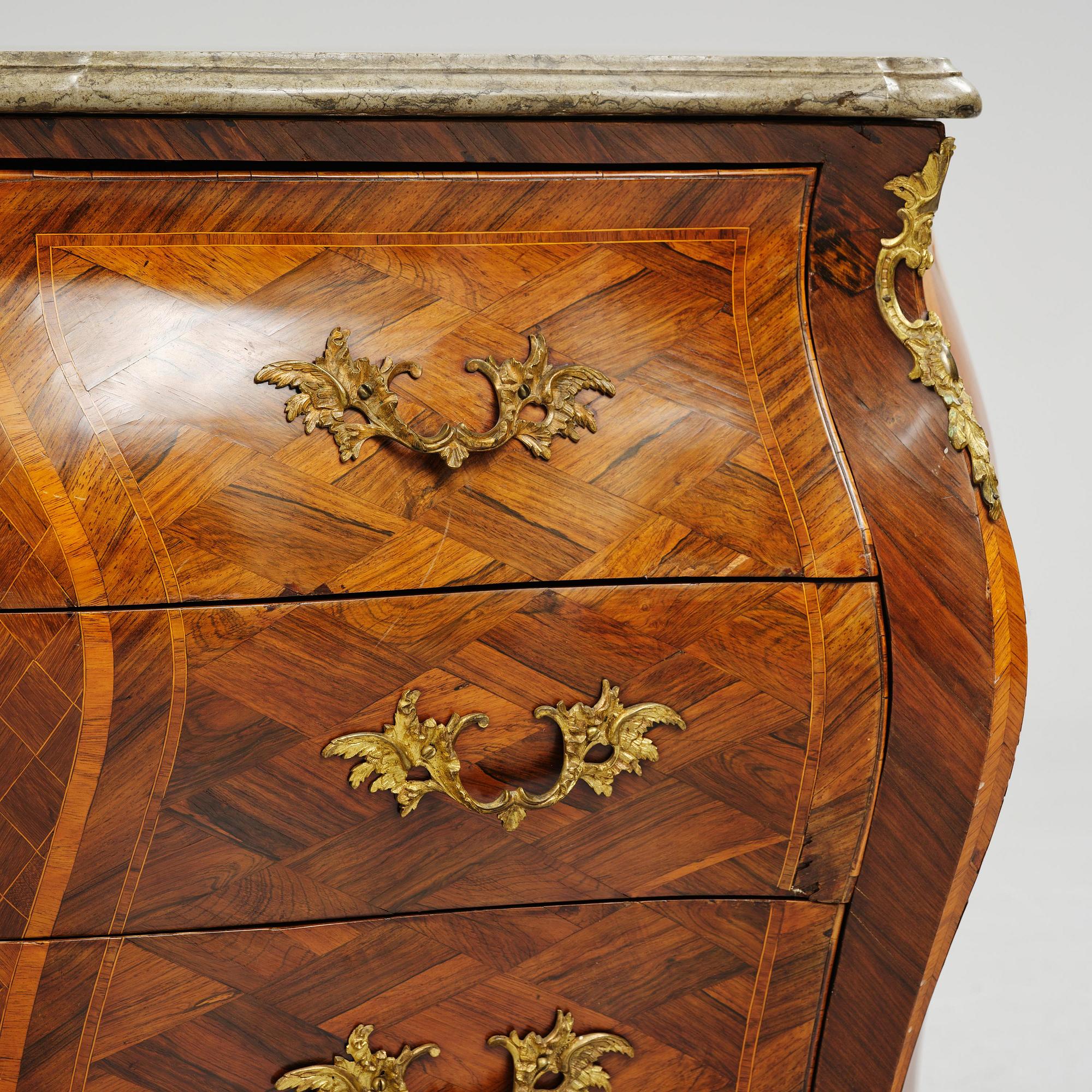 A Swedish rococo parquetry commode attributed to J. Noraeus (master in Stockholm 1769-81).