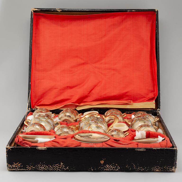 An earthenware teaset in box from the turn of the century 1900.