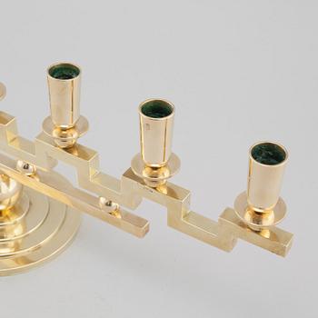 A brass candelabra, attributed to Firma Lars Holmström in Arvika, 20th cenutry.