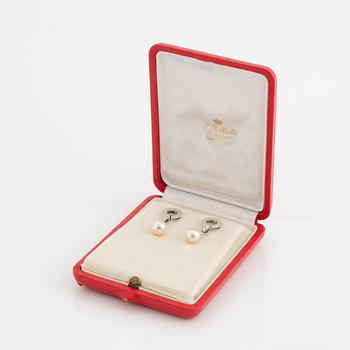 Pearl and brilliant cut diamond earrings.