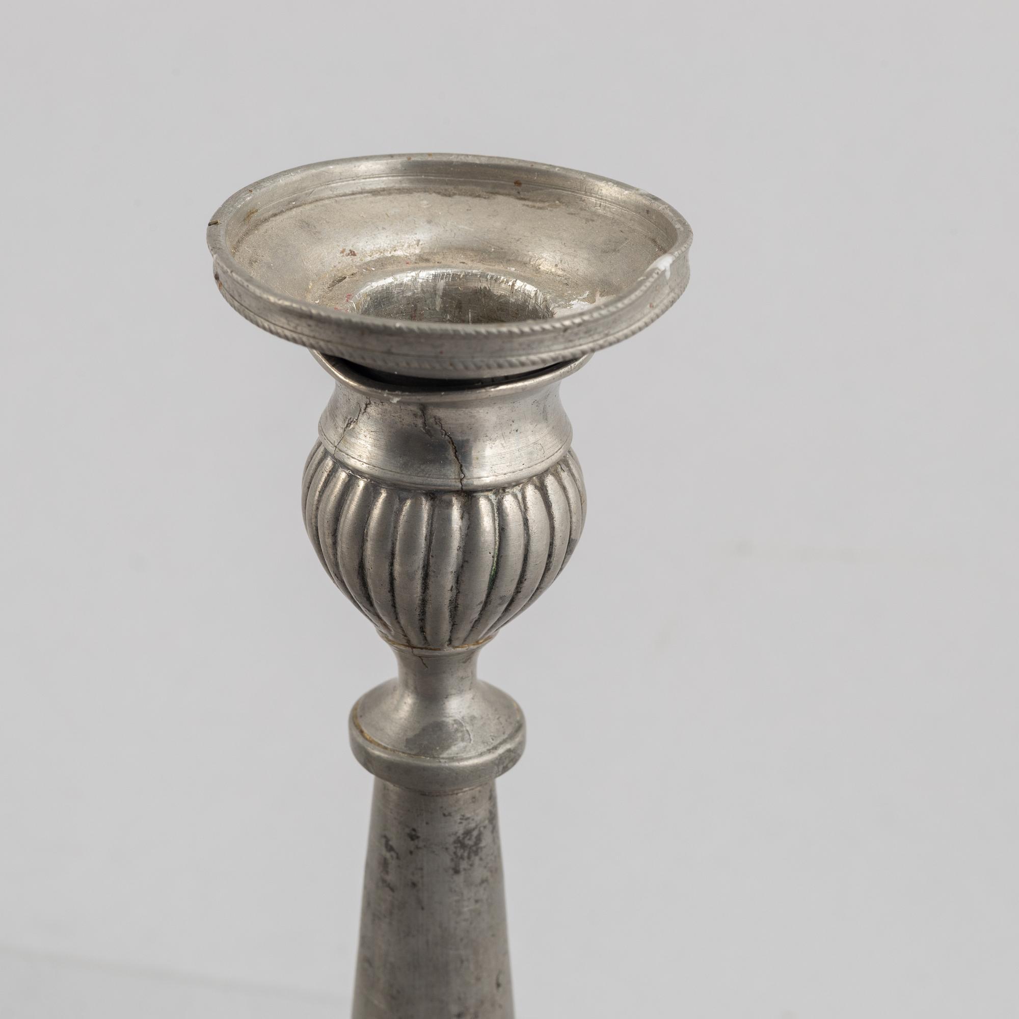 A pair of pewter candle sticks by Olof Wahlgren (active 1817-1825/27), Helsingborg, Sweden, 1813.