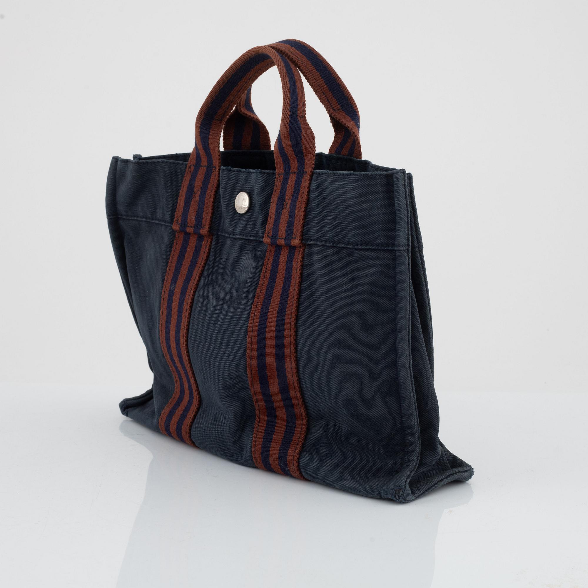 Hermès, "Fourre tout PM" bag and toiletry bag.