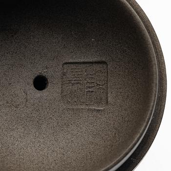 Gu Jingzhou, A dark yixing teapot, 1980s.