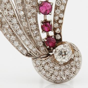 A brooch set with old-cut diamonds with a total weight of ca 2.50 cts and cabochon-cut rubies.