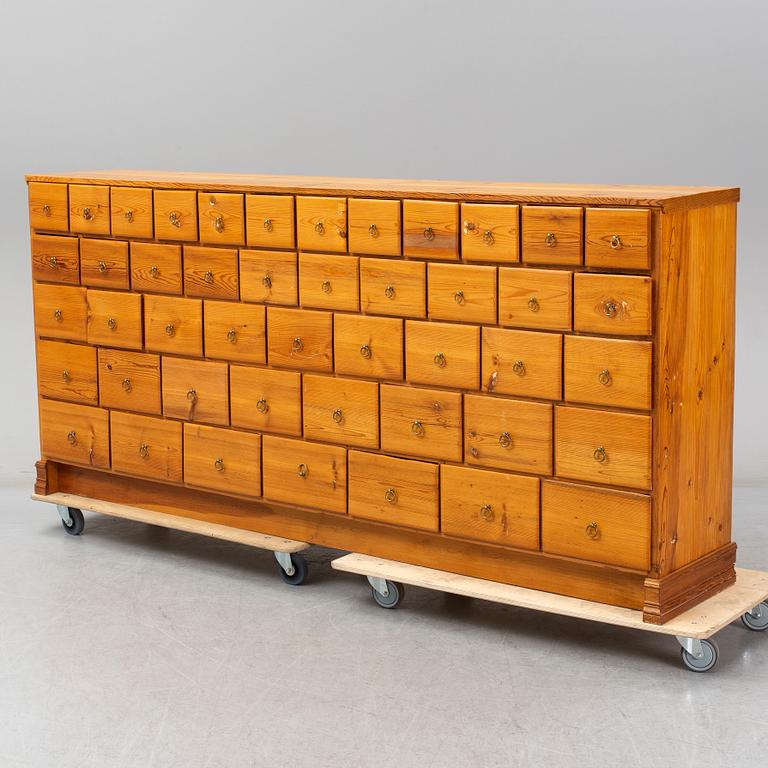A late 19th century pinewood chest of drawers.