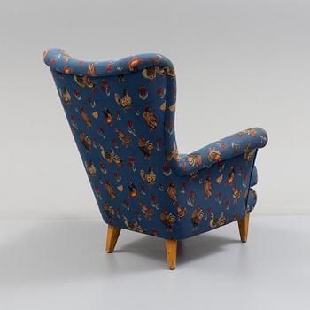 A mid 20th century easy chair.