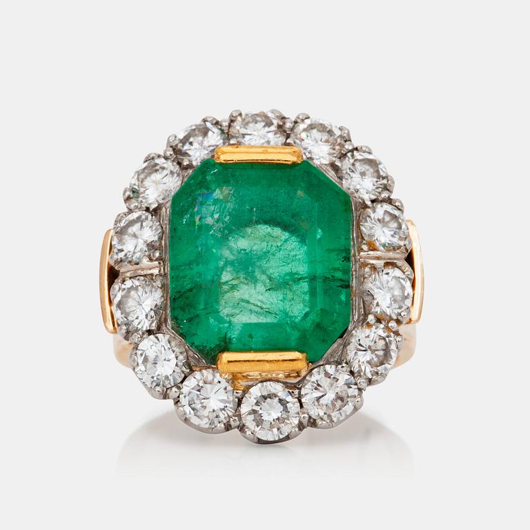 An emerald-cut emerald and brilliant-cut diamond ring.