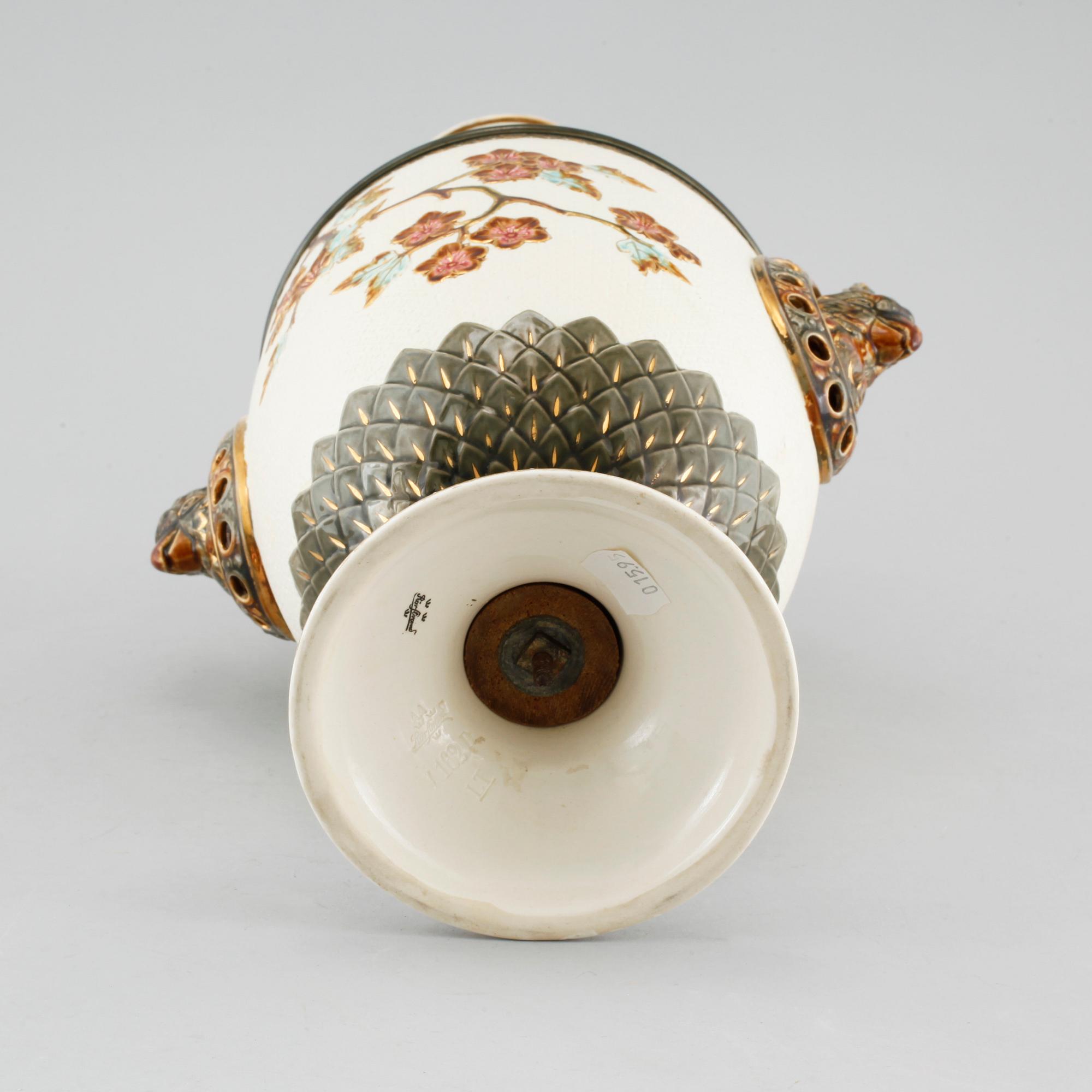 A majolica vase, a flower pot and a jardiniere from Rörstrand, around the year 1900.