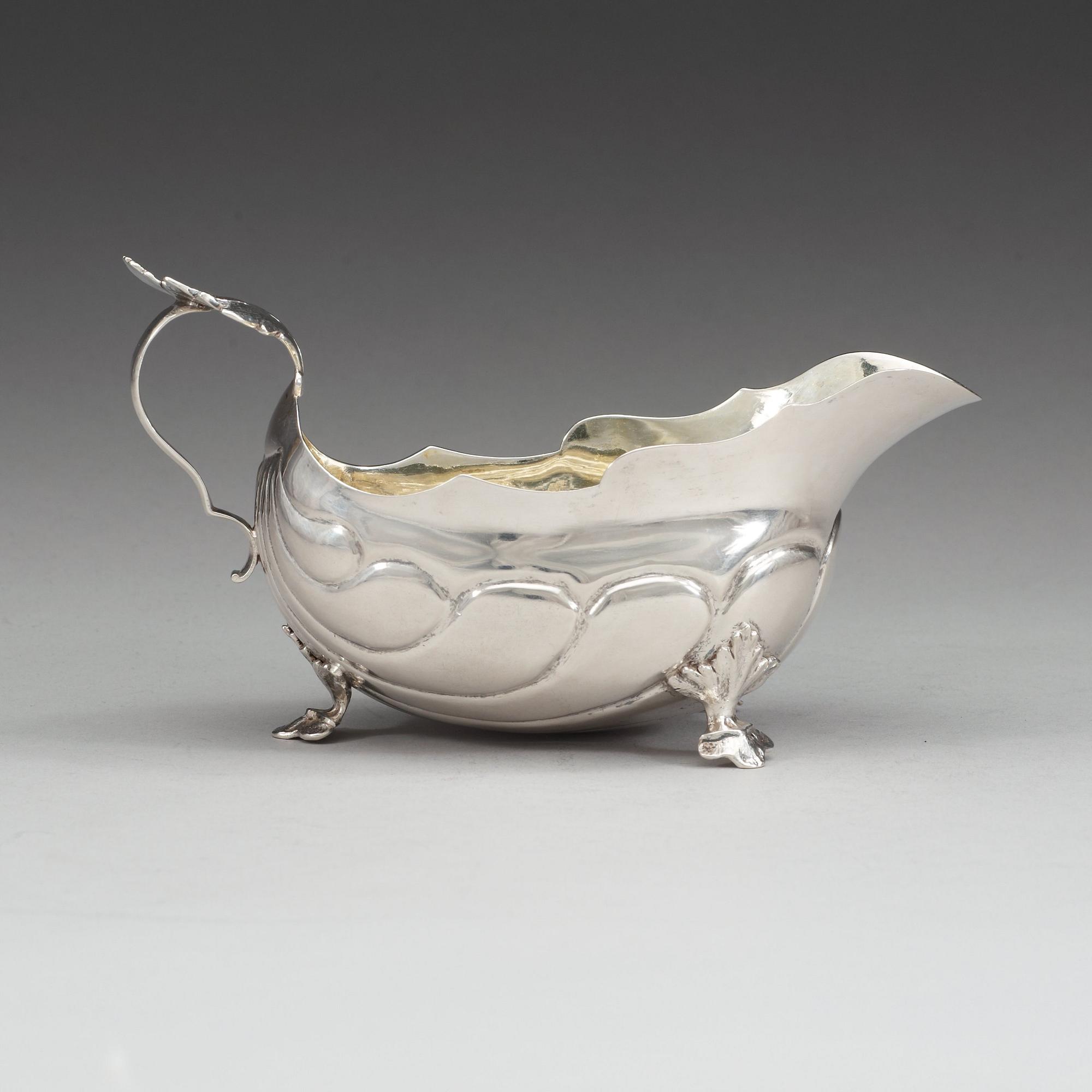 A Swedish 18th century parcel-gilt cream-jug, makers mark of Christian Rothe, Karlskrona 1777.