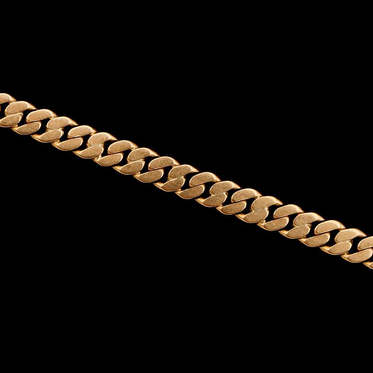 KLOCKKEDJA, 18K guld, svenska stämplar, 1931. Total vikt ca 20 g.