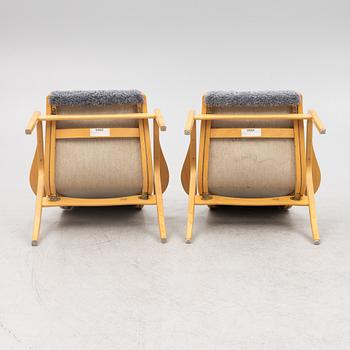 Yngve Ekström, a pair of "Lamino" armchairs for Swedese.