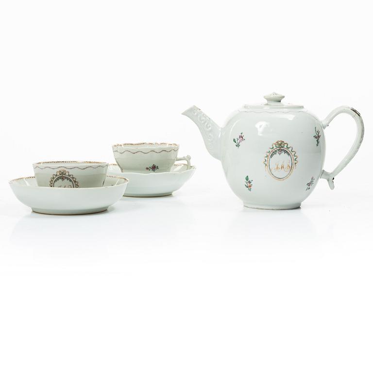 Cups and saucers, 11+7, and a teapot in famille rose with monogram, company porcelain, China, 18th century.
