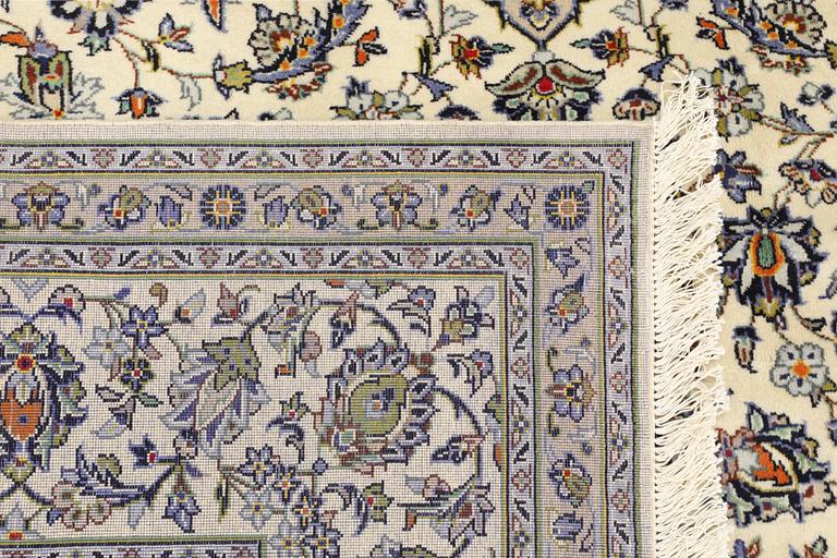 A Keshan carpet, 355 x 260 cm.