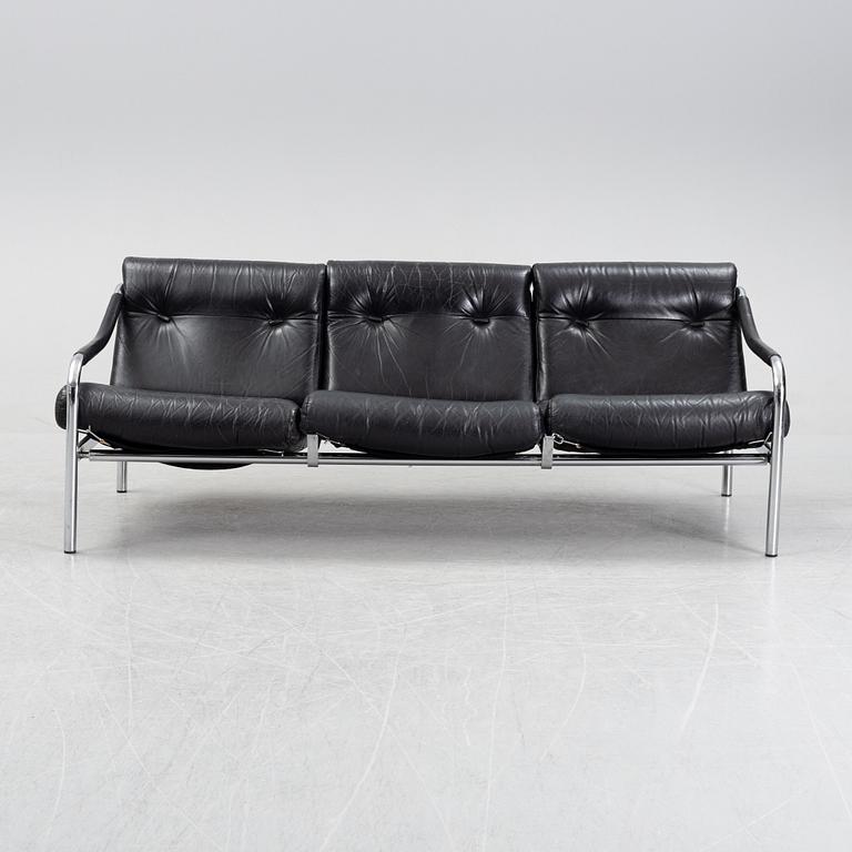 A blad leather upholstered 'Kadia' sofa by Tim Bates for Pieff, 1960's.