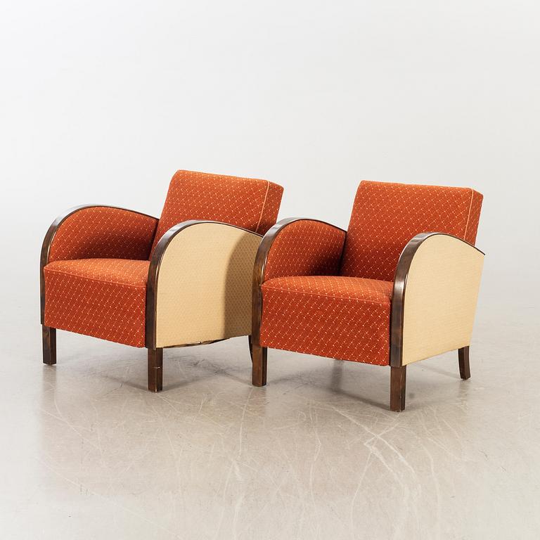 A pair of 1930/40:s Art Deco easy chairs.