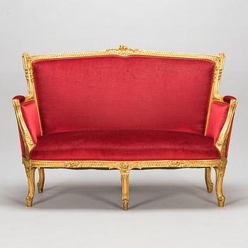 A late 19th century sofa in Louis XVI style.